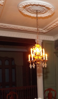 The parlour by Gaic Dellâ€™Accio uses tall CM10_5 columns to support the ceiling which features pretty plasterwork, CR25, PAN4, R3 and C8 cornice